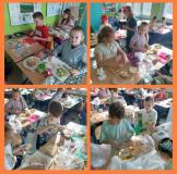 zdjęcie dzieci wraz z przygotowanymi daniami